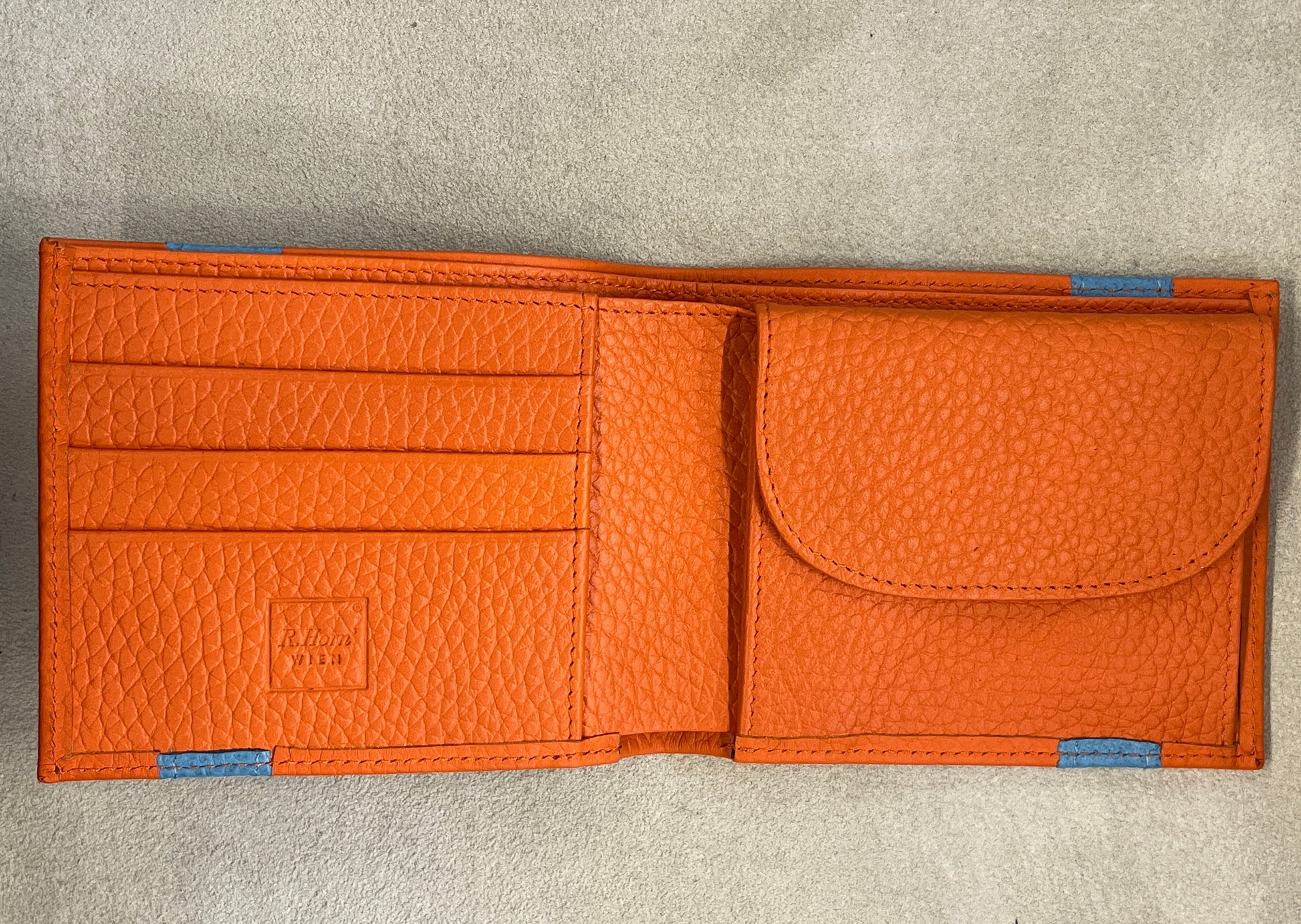 Handgemachte Geldbörse in orange und hellblau, hergestellt von R.Horns Wien.