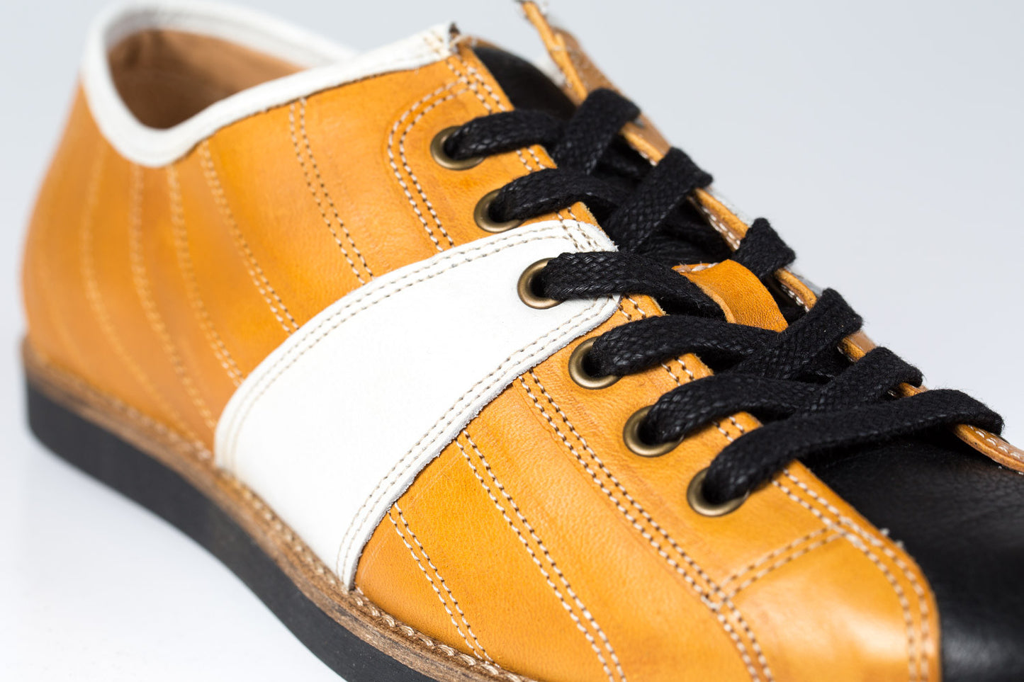 "The Bowler" - ochre/white/black